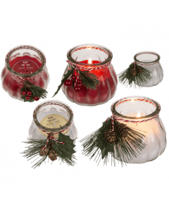 Kaars in glas met kerstdecoratie